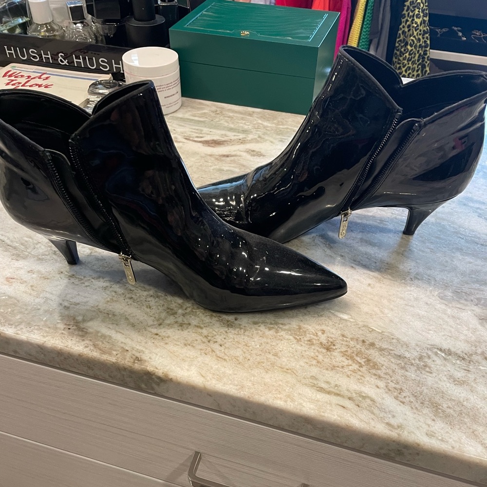 Shiny “wet” booties by Circus